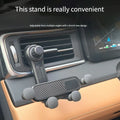 Zovira™ Gravity Car Phone Holder – Foldable 360° Rotating Vent Mount